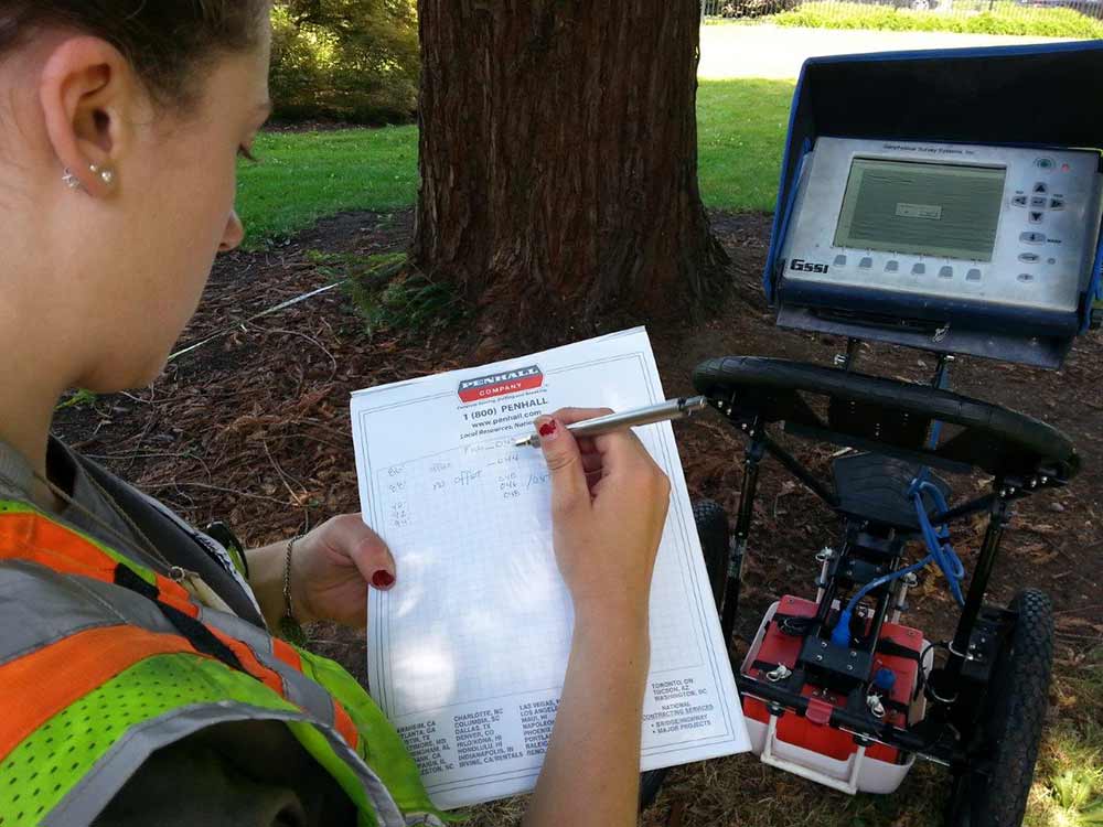 Worker writing GPR report