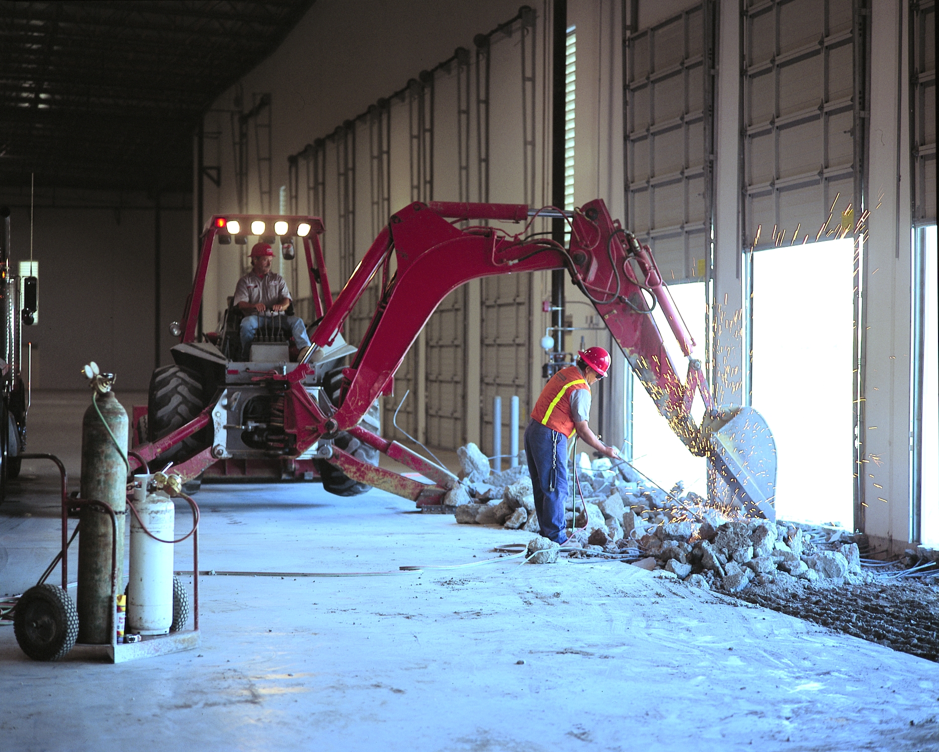Backhoe and torch