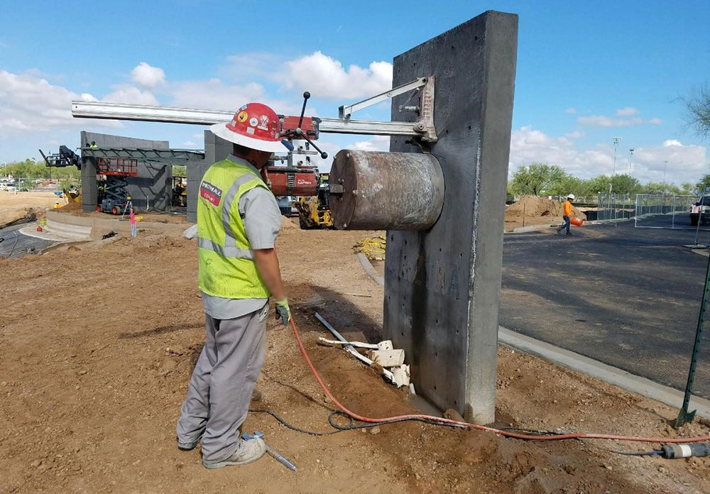 Employee performing concrete coring