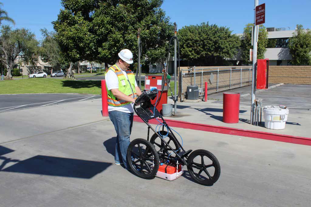 worker running ground penetrating radar rig